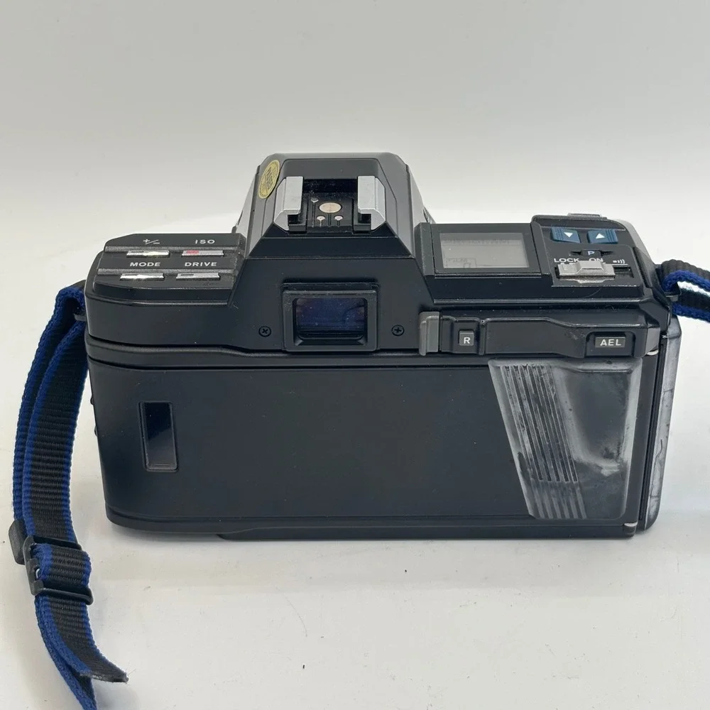 Minolta Maxxum 7000 35mm SLR Film Camera with 50mm f1.7 Lens and 2800 AF Flash